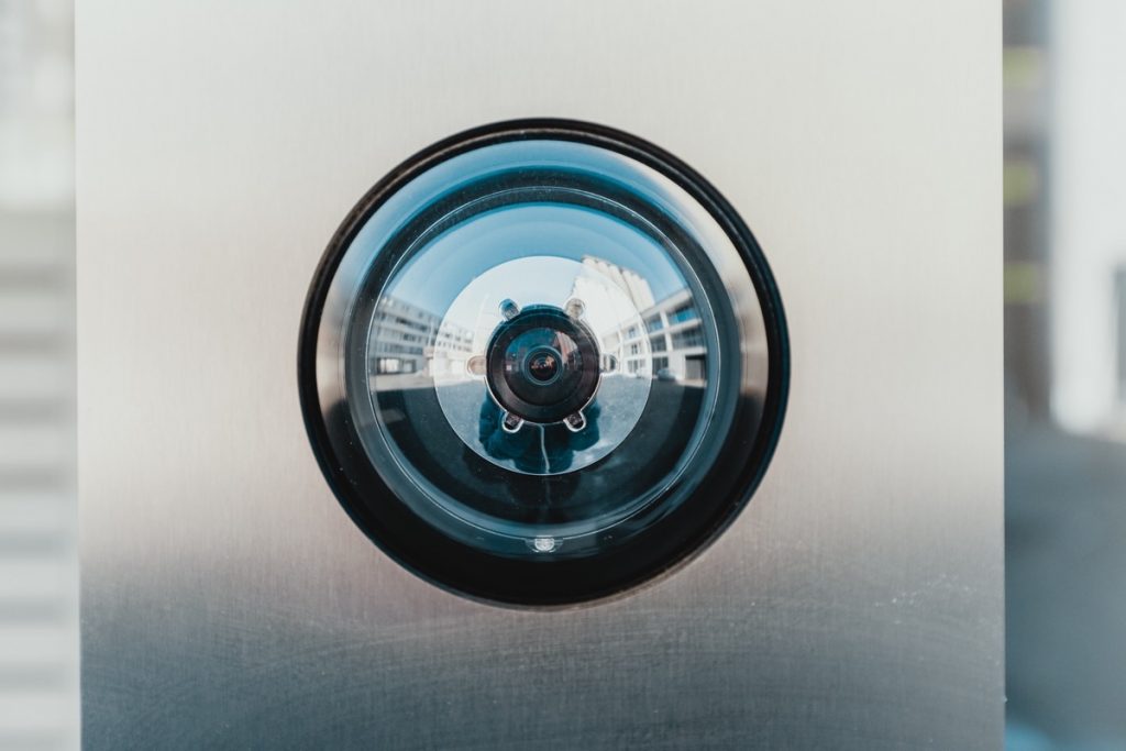 Photo of a security camera (credit to Bernard Hermant from Unsplash)