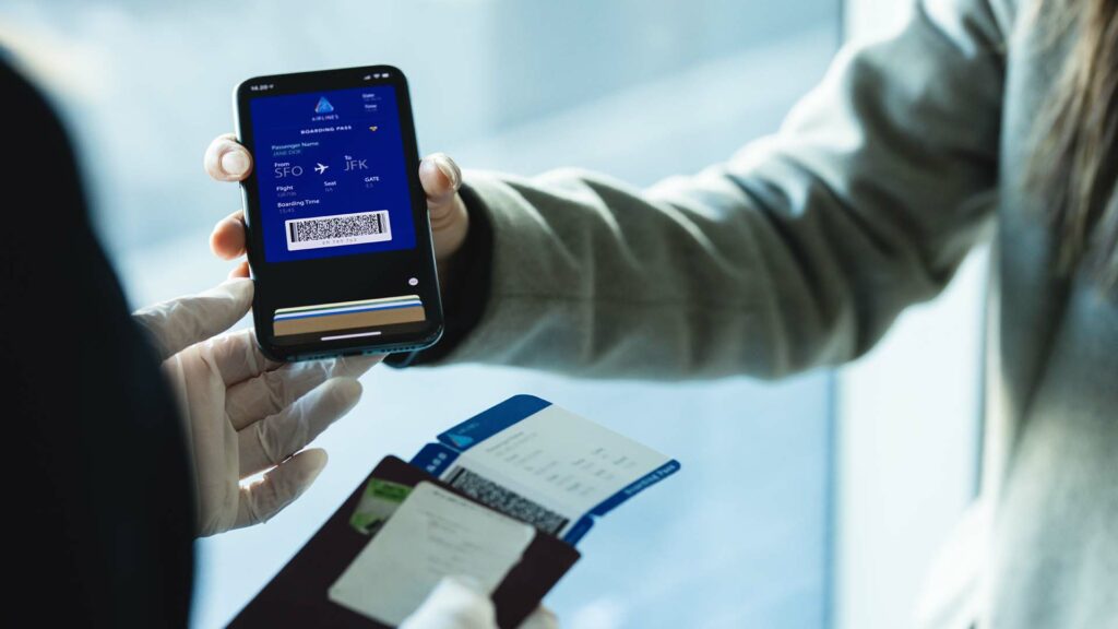 Barcode use case at an airport. A QR code being presented on a smart phone.
